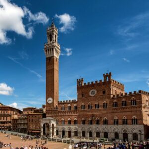 Explore the historic Palazzo Pubblico and Torre del Mangia in Siena's Piazza del Campo.